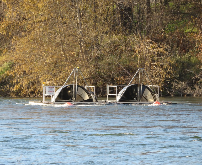 Rotary screw traps in river