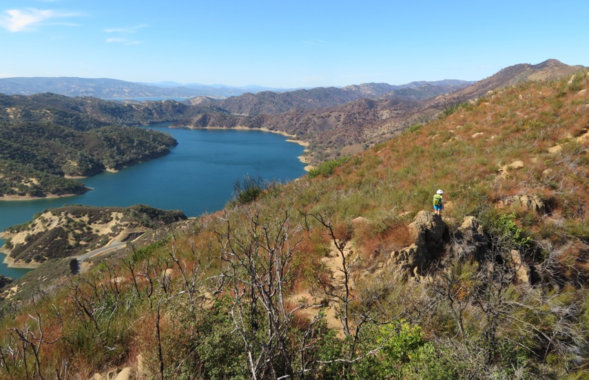 Norma on trail with Lake Berryessa in background