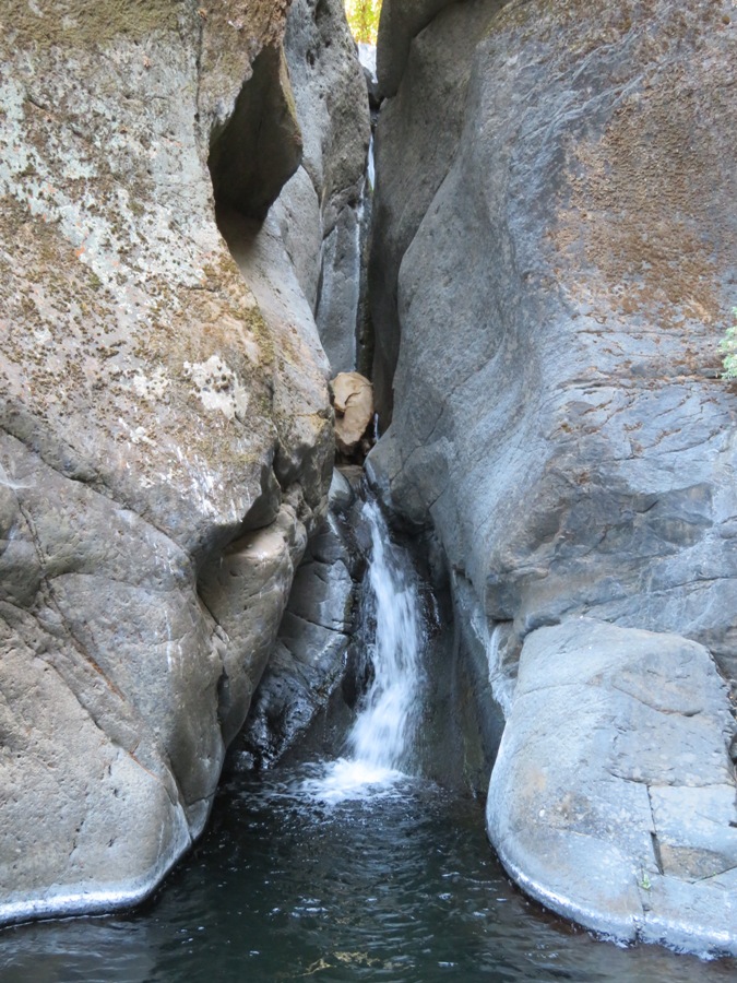 Water falling between rocks