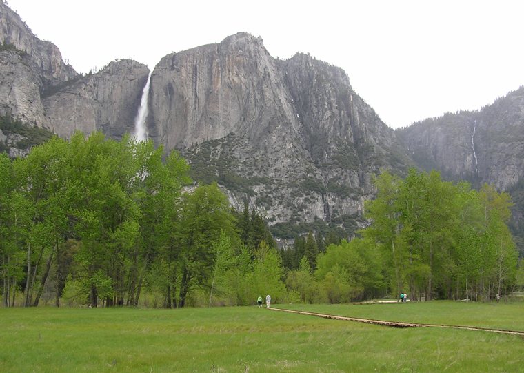 Yosemite Falls from a distance with a boardwalk in front