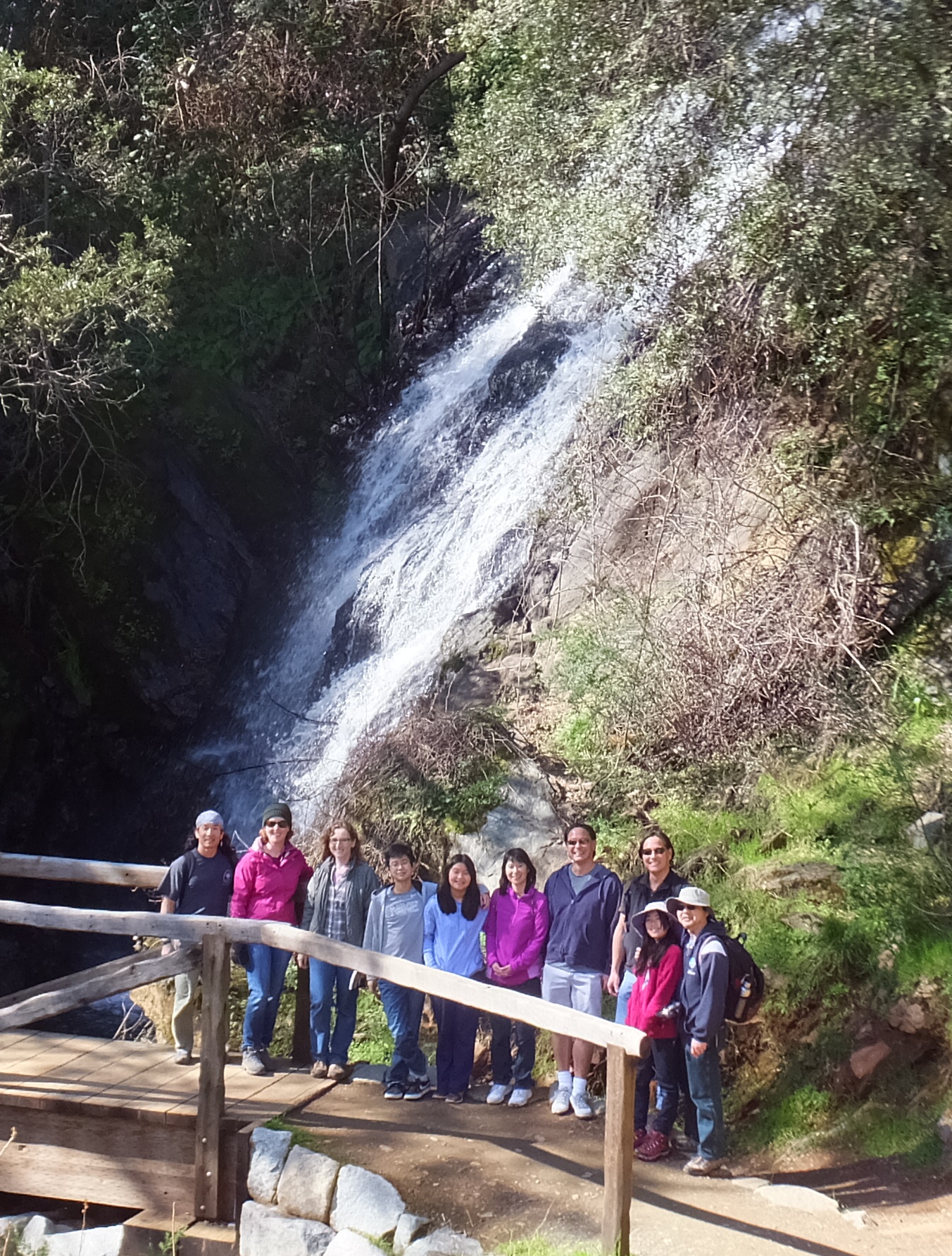 Group photo at waterfall