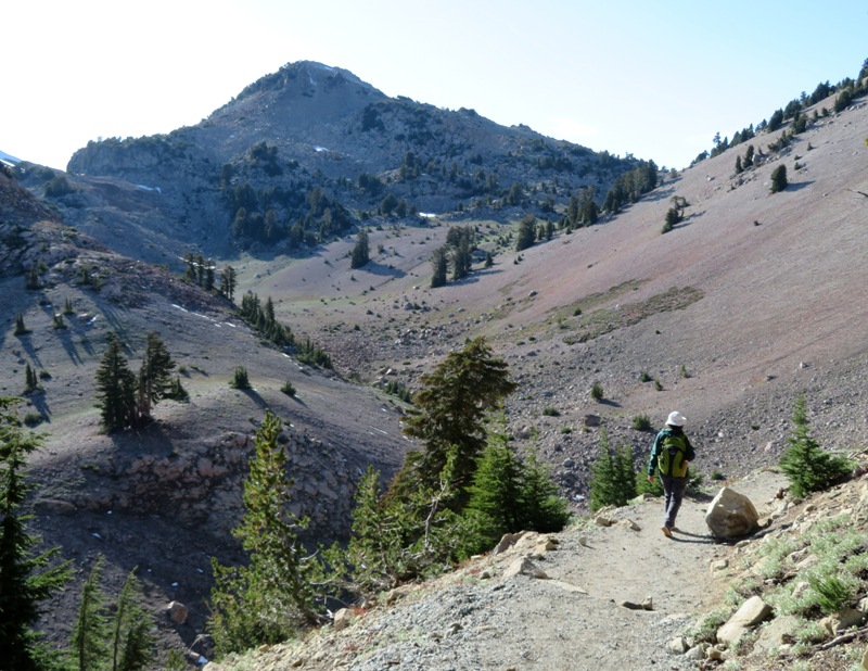 Norma hiking with valley below