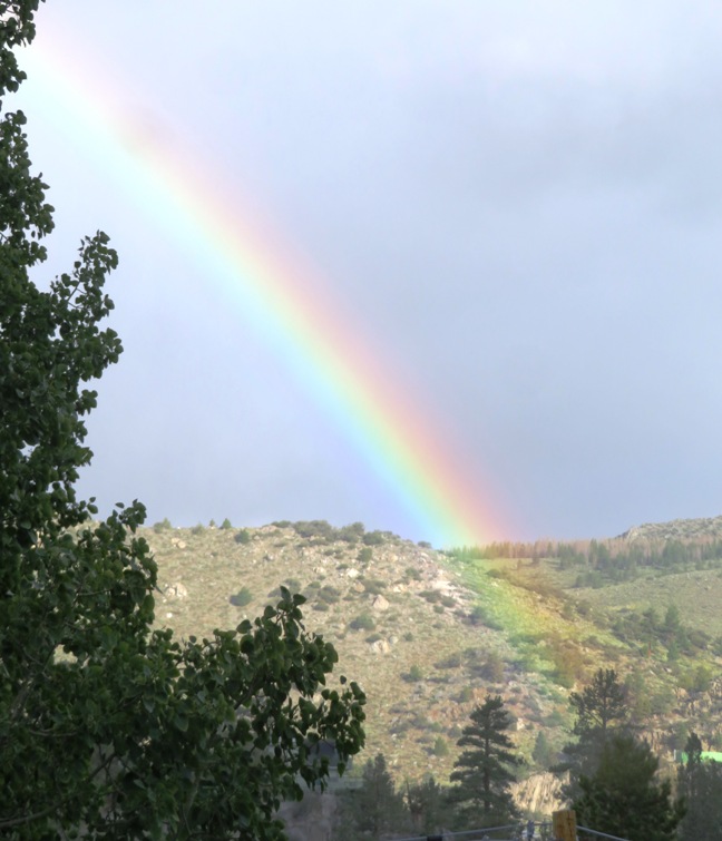 Rainbow in front of mountains