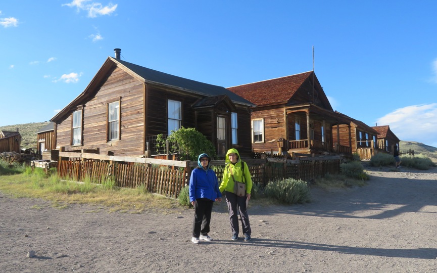 Mom and Norma in front of a residential home