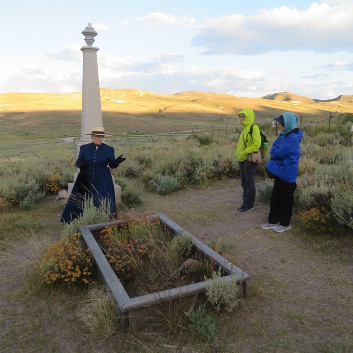 Norma, Mom, and second tour guide behind gravesite