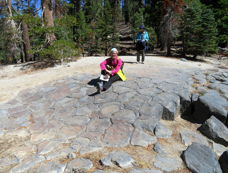 Norma sitting on the top part of basalt columns