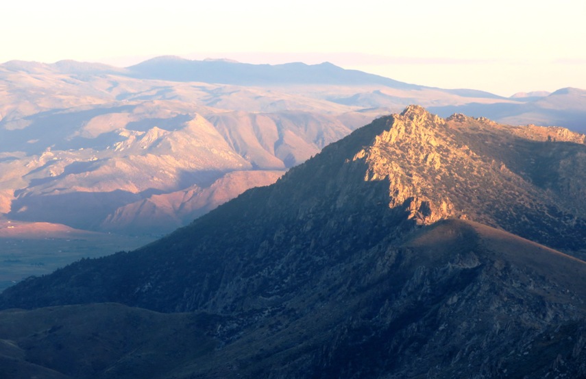 Rugged mountain with other mountains in the background