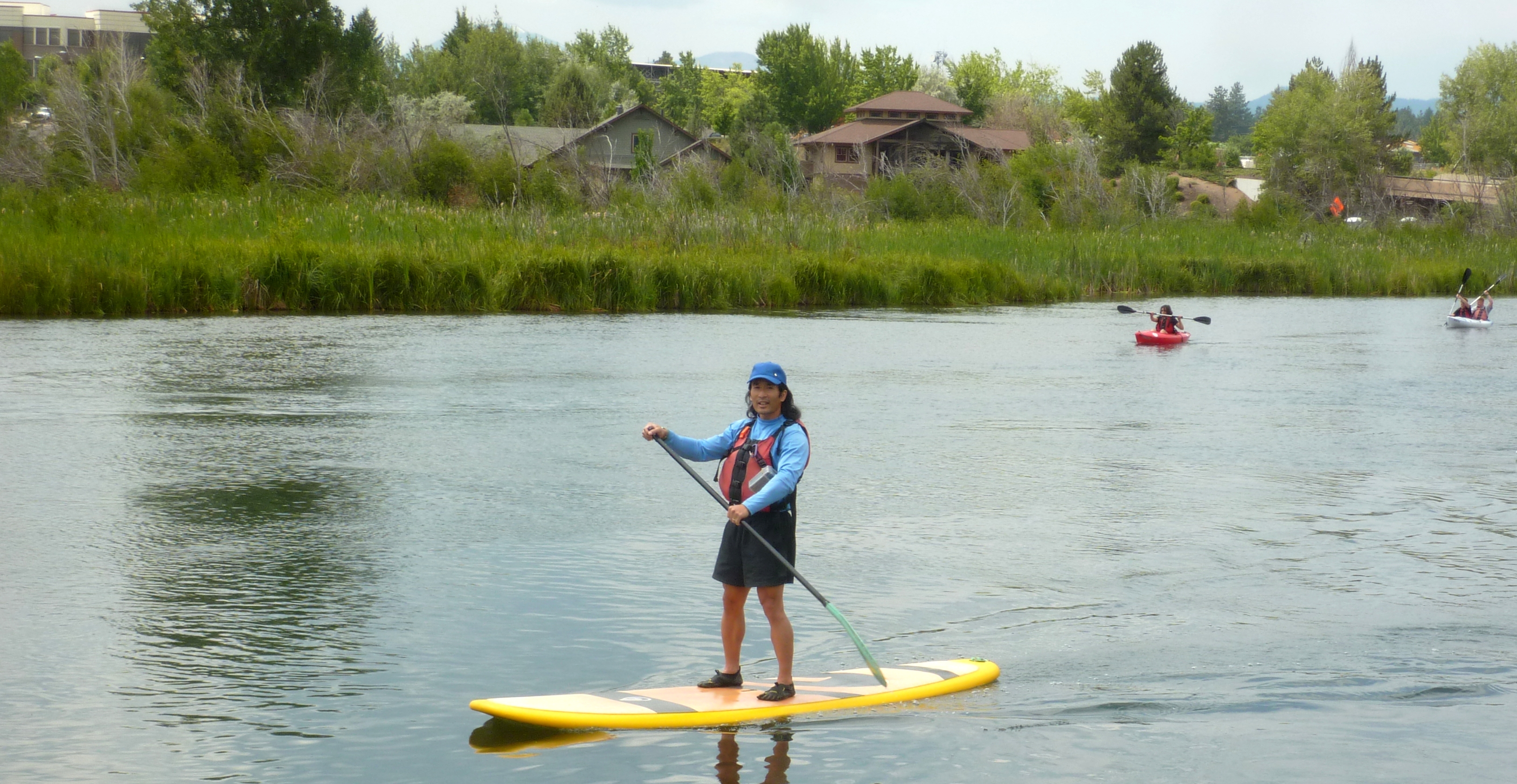 Me paddleboarding on the Deschutes River