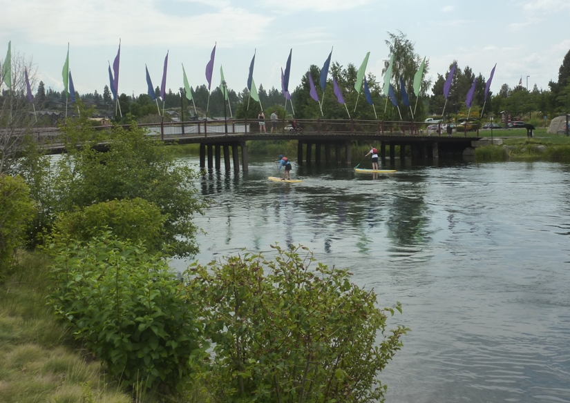 Paddling under a pedestrian bridge