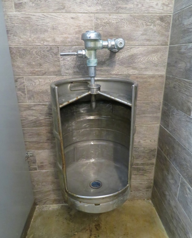 Beer keg turned into a urinal