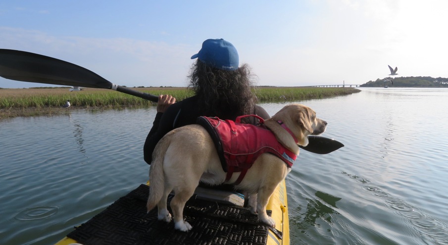 Daphne and I on the kayak with the Chesapeake Bay Bridge-Tunnel in the distance