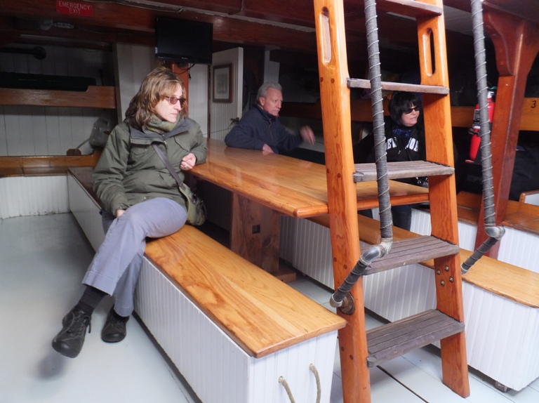 Norma seated at bench on the Lady Maryland