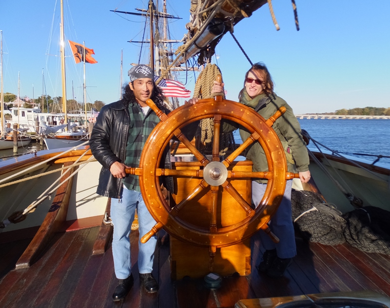 Norma and I at the wheel of the Pride of Baltimore II