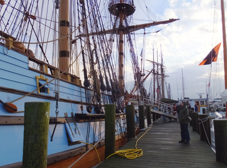 Norma looking up at the ship from the pier