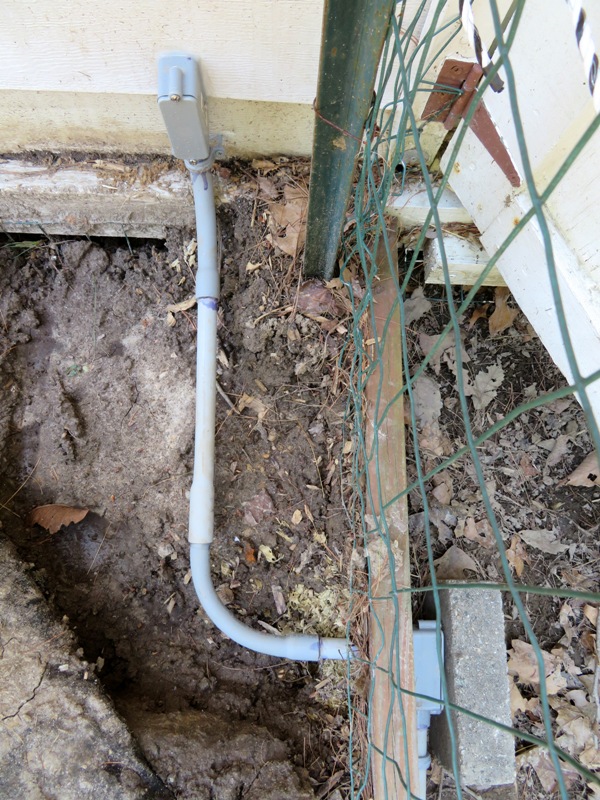 Conduit entering shed