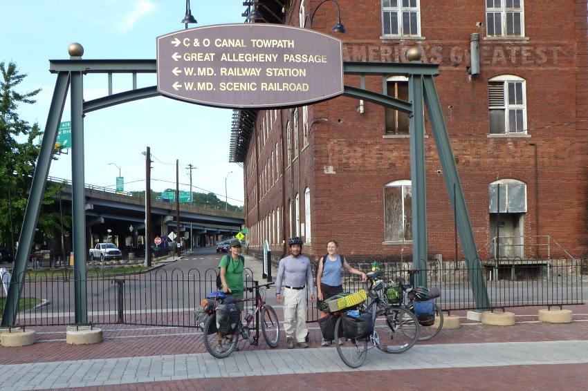 The three of us under big bike trail sign