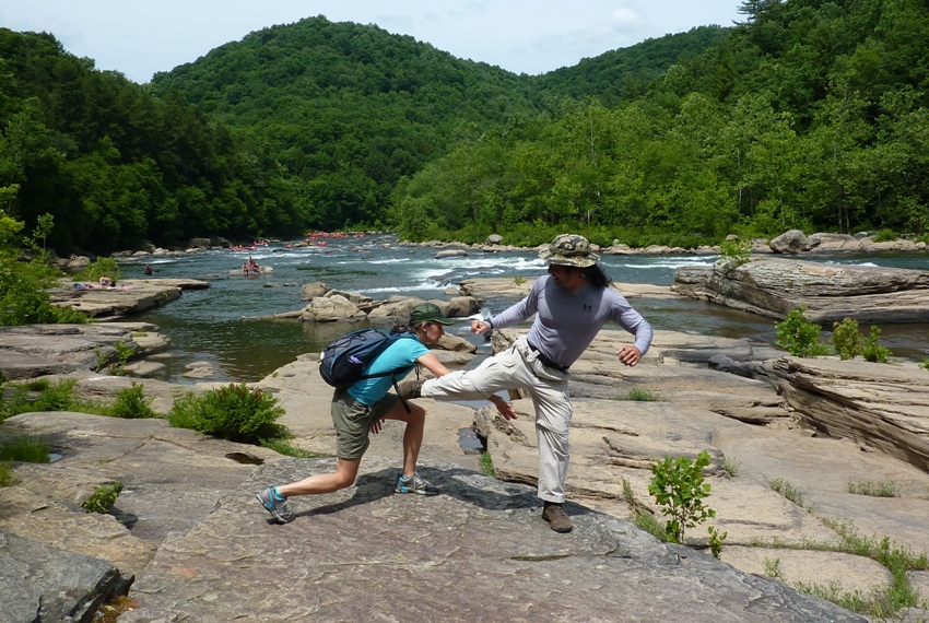 Carmen and I sparring on the rocks with the river in the background