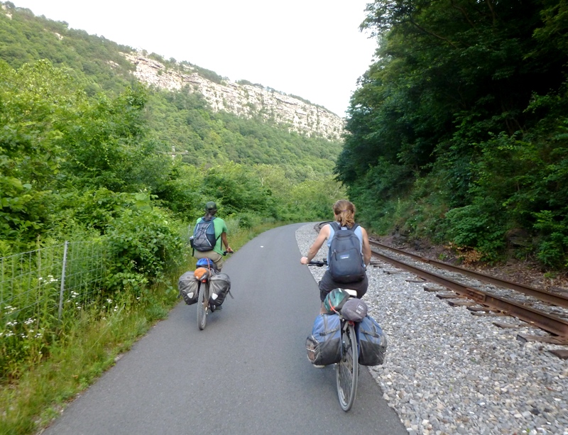 Carmen and Norma biking with Lovers Leap in the background