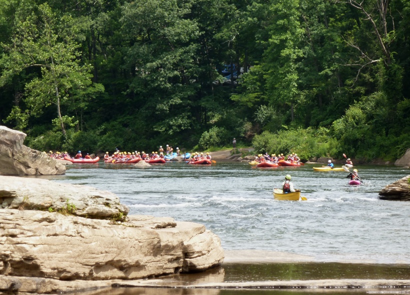 Hordes of people on rafts