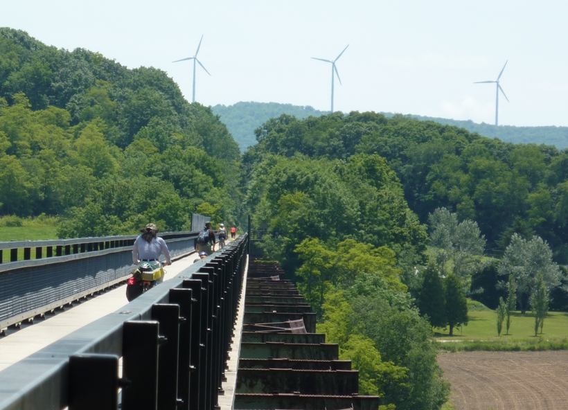 Biking on the Salisbury Viaduct with wind turbines in the background