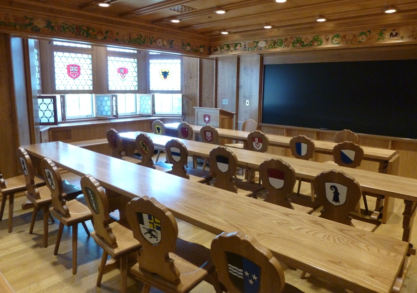 Room with tables and decorated chairs