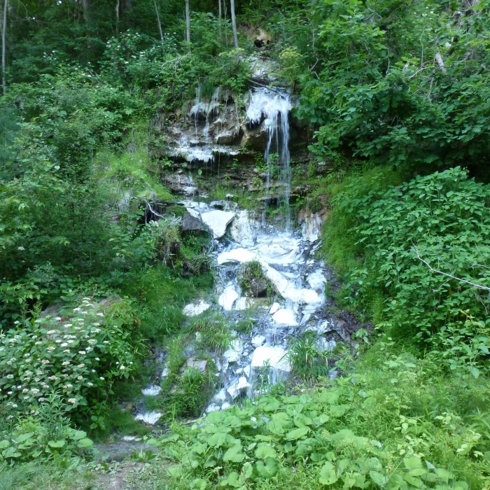 Water flowing over white rocks