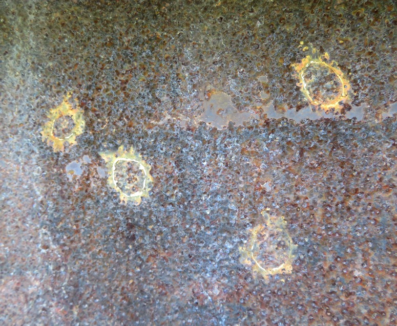 Round marks on I-beam