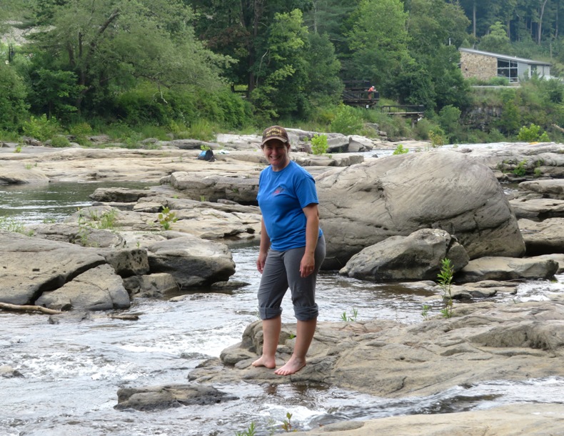 Laah standing on rocks