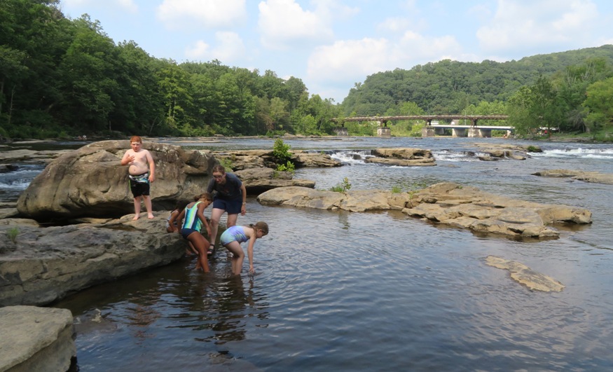 Norma, kids, and bridge in the background