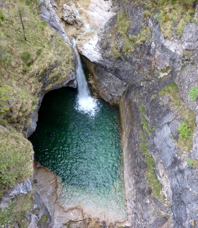 Overhead view of waterfall and pool of water