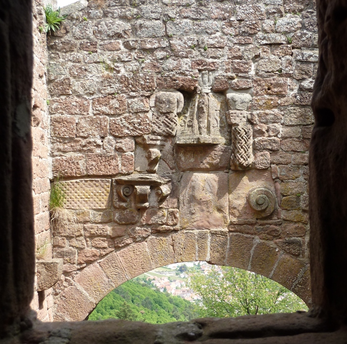 Intricate carvings made in stones on the wall of the castle