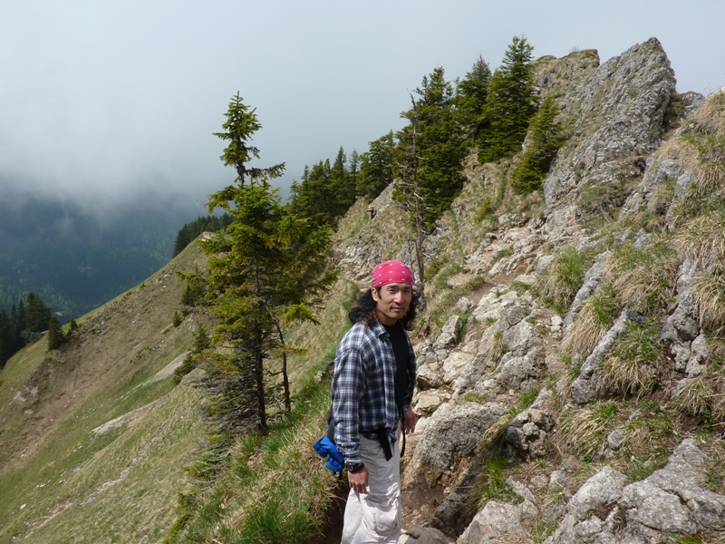 Me in the Alps with mountains behind