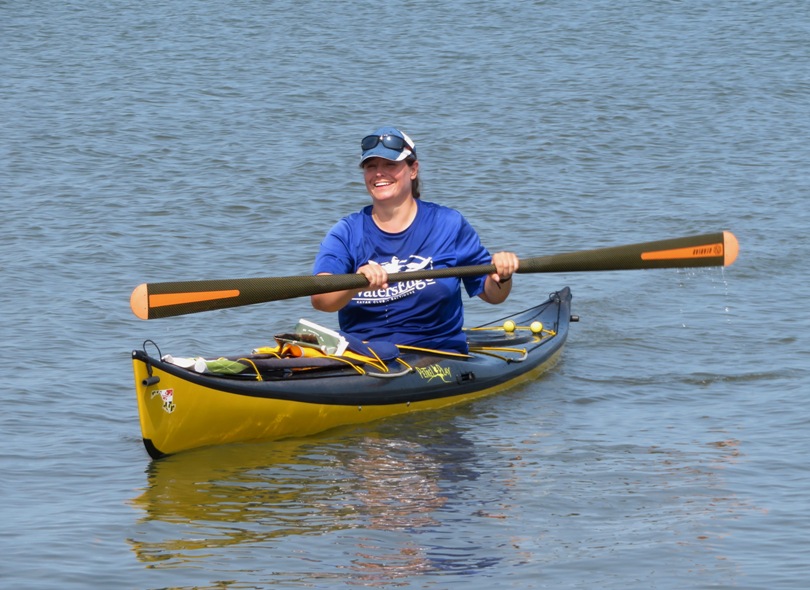 Jessica kayaking and smiling