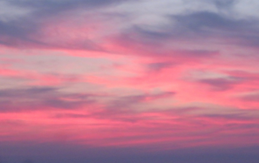 Red clouds illuminated by the setting sun