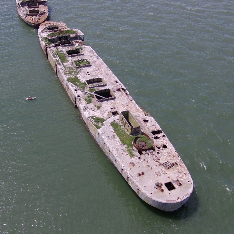 Kayak next to S.S. Arthur Newell Talbot