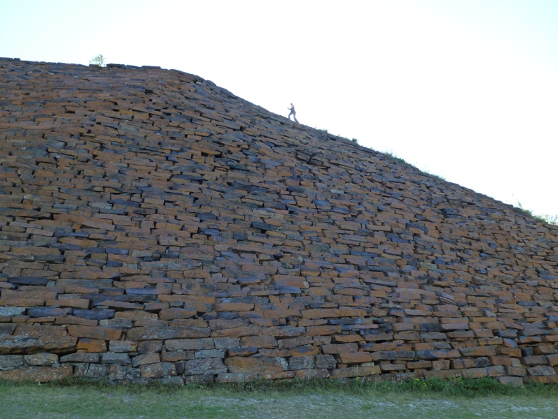 Norma on top of stone wall