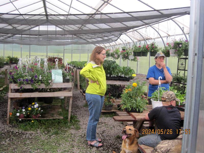 Norma and Laah in greenhouse