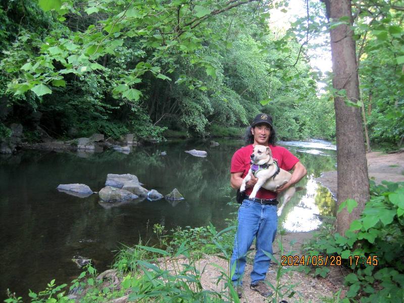 Me holding Daphne with the Patuxent River behind