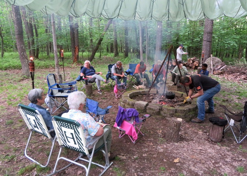 People gathered at campsite