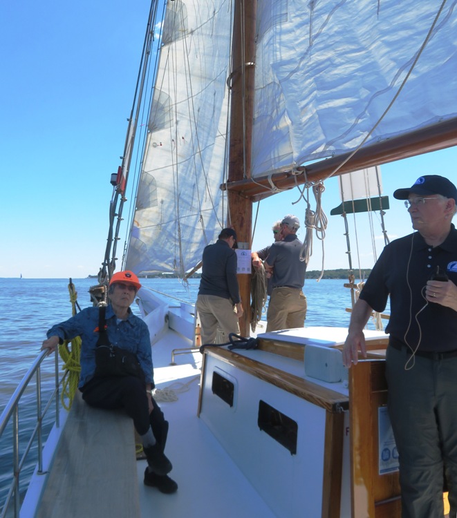 Mom looking up at sail