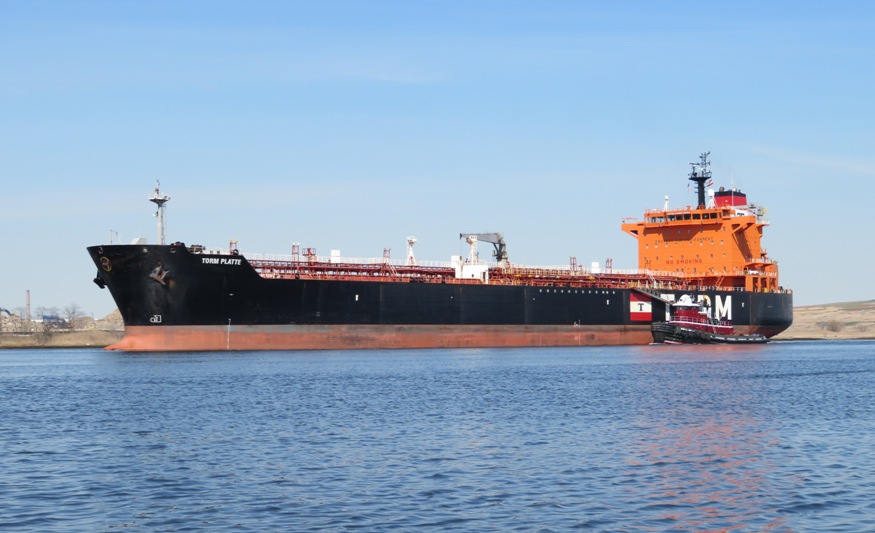 Cargo ship and tugboat