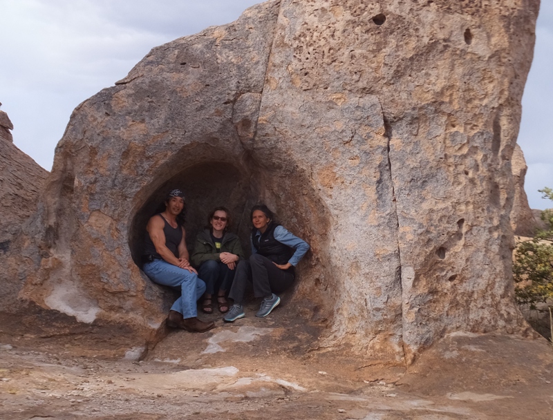 A large indentation in the boulder can provide us shelter