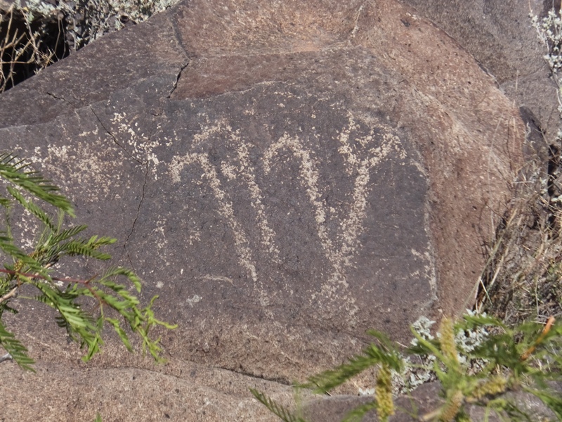 Petroglyph of dancing candy canes