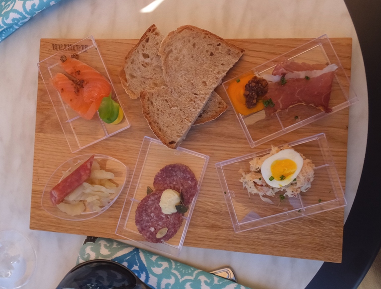 Smoked salmon, ham, sausage, and other local specialties