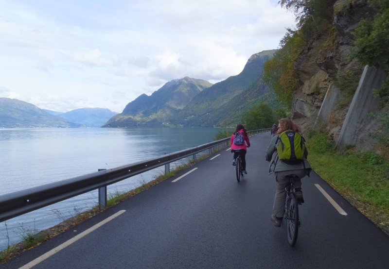 Norma and Chi-son biking with Carmen leading the way