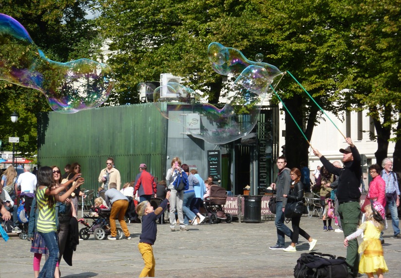 Man making giant bubbles