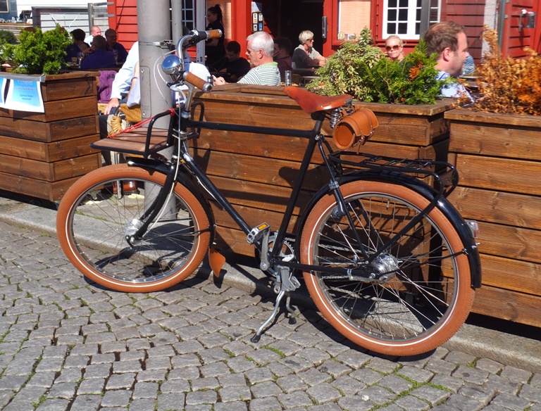 Classic black bike with brown trim