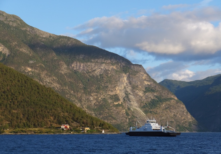 Ferry boat with mountains behind