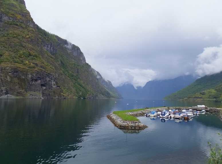 Mountains, fjord, and pier