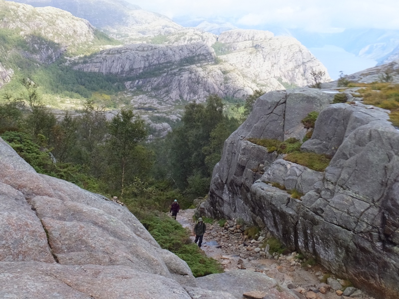 Two hikers in low area